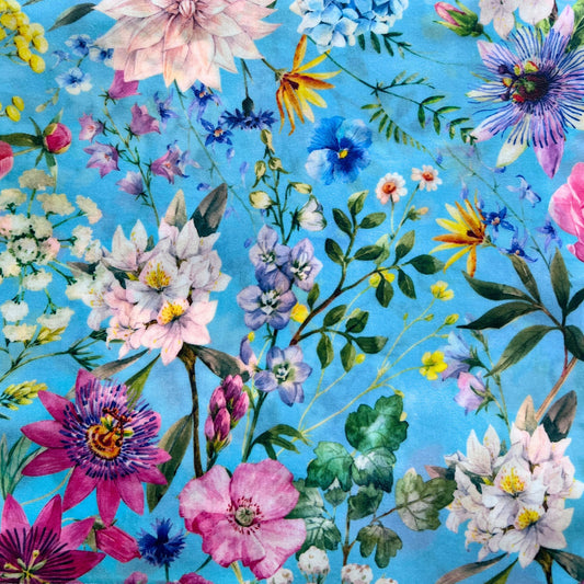 Colorful hydrangea floral pattern on a blue beeswax wrap
