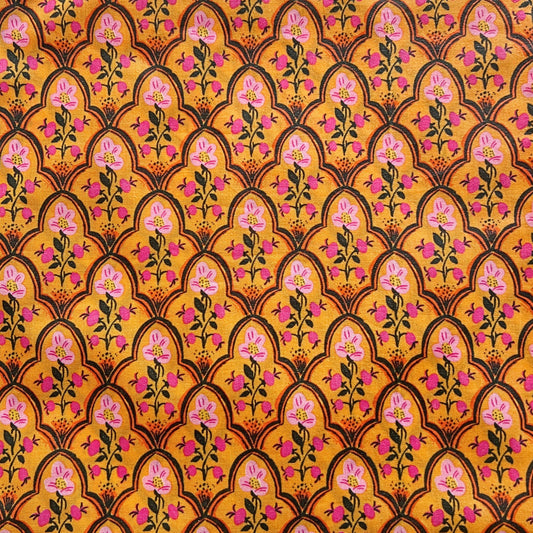 simple pink floral design on a orange beeswax wrap