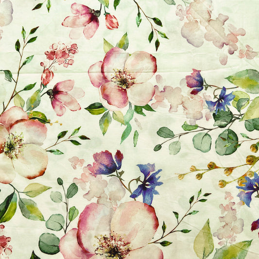 Floral pattern with pink, purple, and green appleblossom flowers on a white beeswax wrap