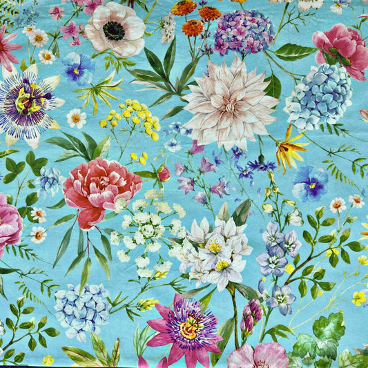 Colorful hydrangea floral pattern on a blue beeswax wrap
