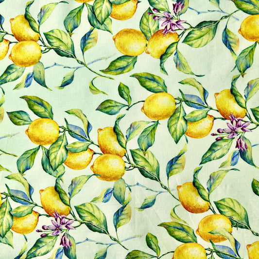 Pattern of lemons and leaves on a white beeswax wrap