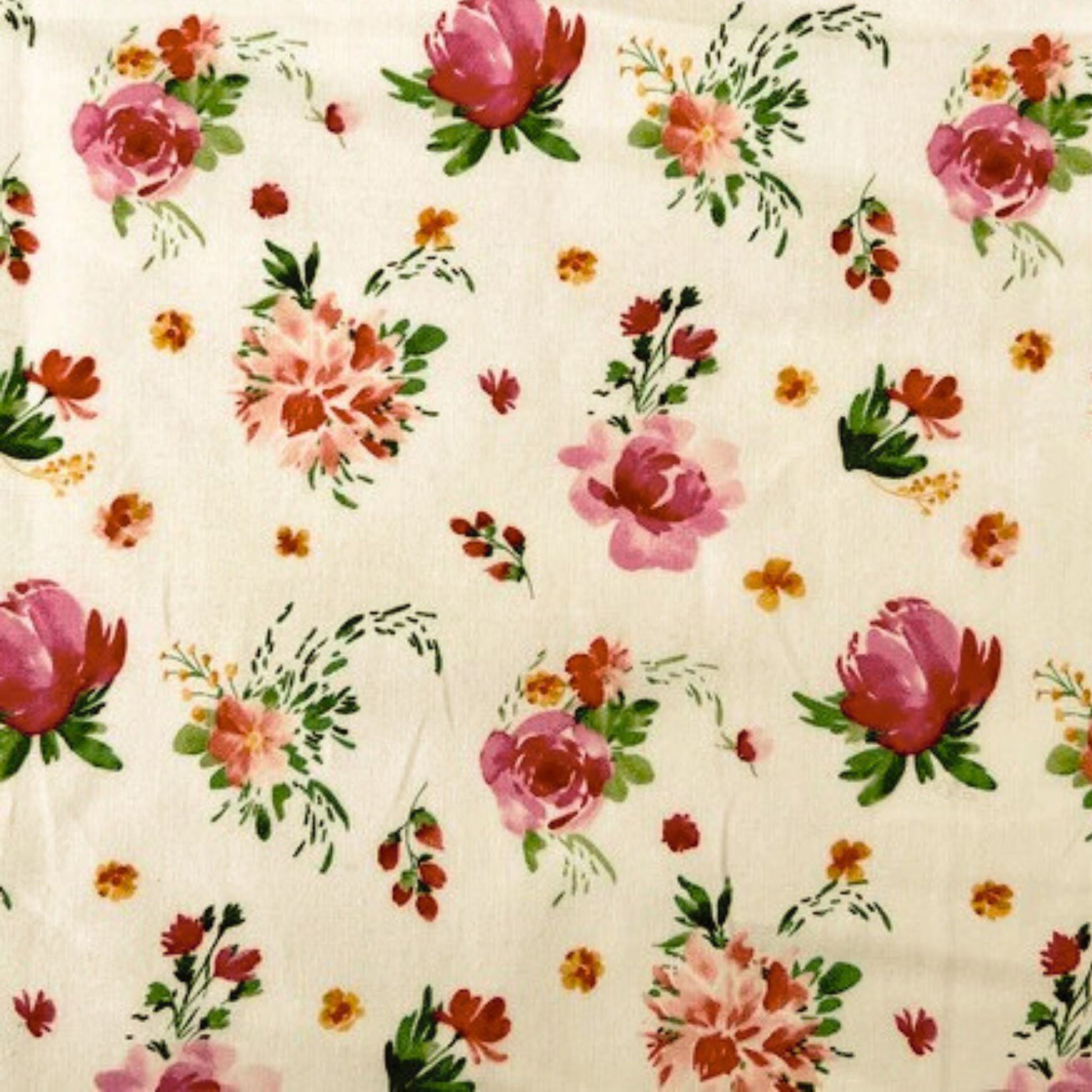 Floral pattern with pink and red flowers on a white beeswax wrap