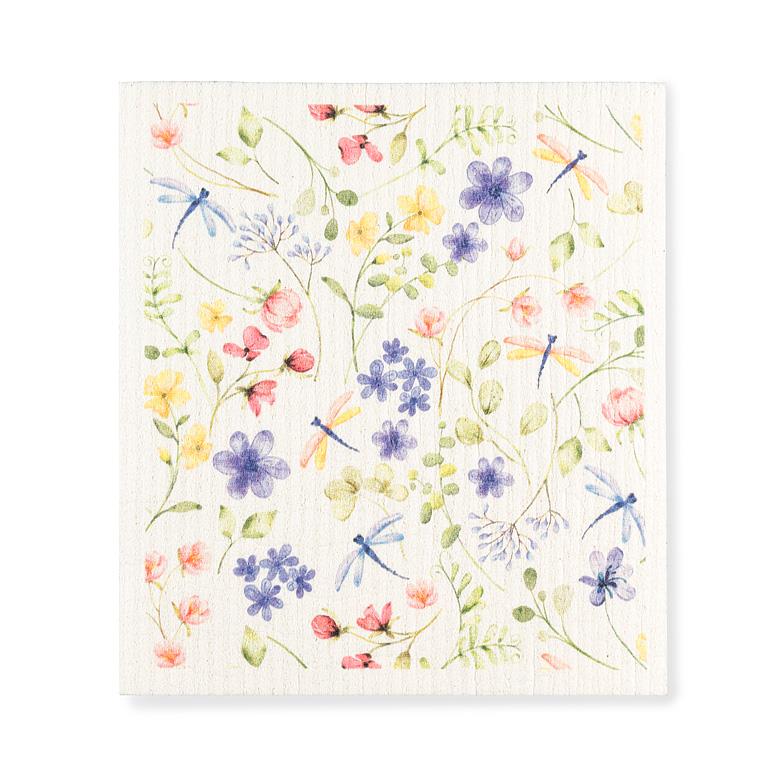 Floral and dragonfly pattern on a white swedish dishcloth